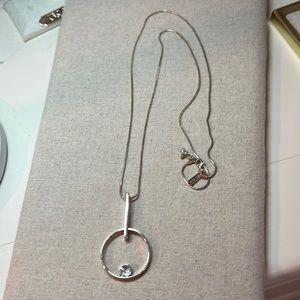 NWOT long gold necklace with circle design